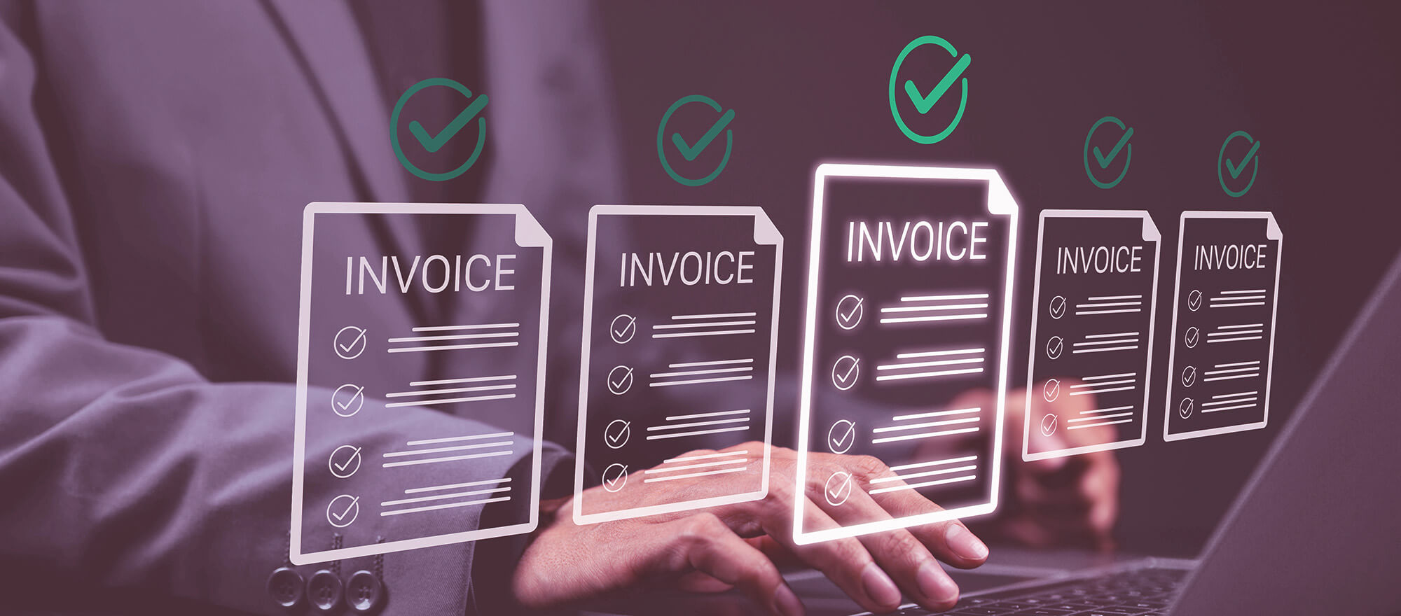Man at a computer with electronic invoices in place, showing tick above each invoice - moving his invoicing from pay-and-bill finance to invoice finance